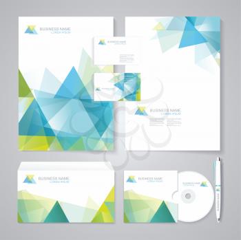 Corporate identity template with blue and green geometric elements. Documentation for business.