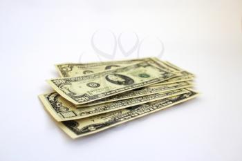 Some dollar banknotes isolated on a white background