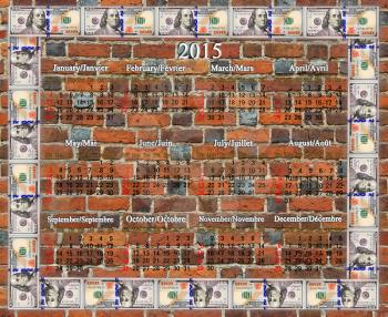 calendar for 2015 year with frame from the dollars on the brick wall background