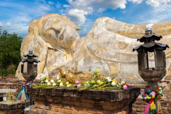 Sleeping Buddha (Reclining Buddha) in Ayutthaya, Thailand in a summer day