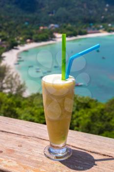 Fresh organic mango shake in restaurant on Ao Thong Nai Pan Noi beach on Koh Phangan island, Thailand in a summer day