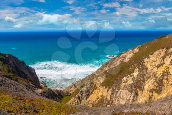 Cabo da Roca. Cliffs and rocks on the Atlantic ocean coast in Sintra in a beautiful summer day, Portugal
