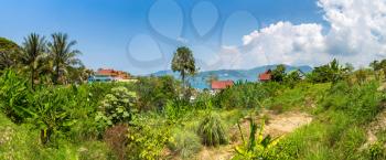 Panorama of Patong beach and Andaman sea on Phuket in Thailand in a summer day