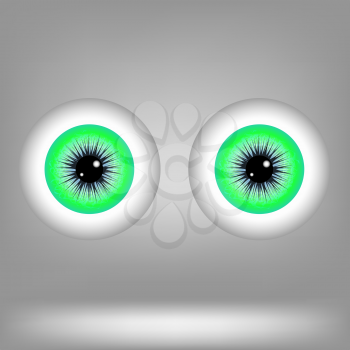Green Eyes Isolated on Grey Background. Part of Human Face.