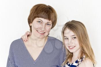 Close portrait of beautiful happiest mother and daughter