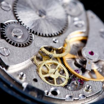 gears in disassembled wristwatch close up