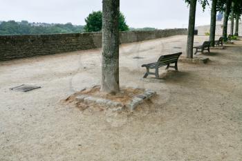 benches on old fortified wall in Dinan, France