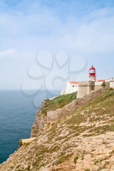 red lighthouse in Cape Saint Vicent, Portugal