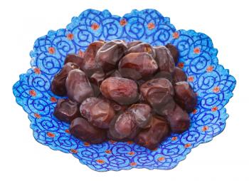 sweet dates on iranian plate isolated on white background