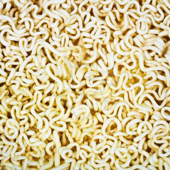 background from dried instant noodles close up