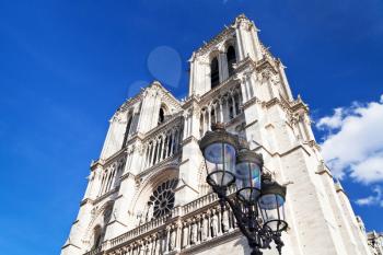 urban lantern and towers of Cathedral Notre-Dame de Paris