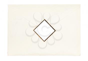 sealed paper envelope sealed by cut out stamp isolated on white background