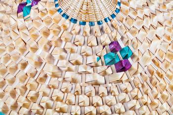 fragment of Vietnamese style conical straw hat close up