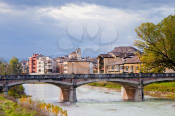 panorama with Parma stream and Ponte Verdi in autumn day, Italy