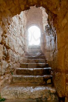 entrance in medieval Ajlun Castle in foggy day, Jordan