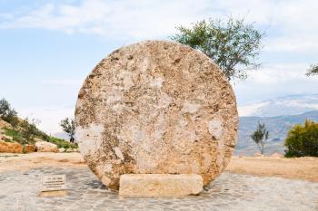 Abu badd - rolling stone used as door of Byzantine Monastery on mount Nebo, Jordan