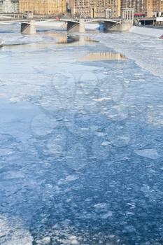 ice blocks on frozen Moscow river in sunny winter day