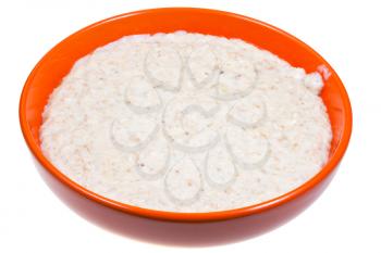 english oat porridge with milk in orange bowl isolated on white background