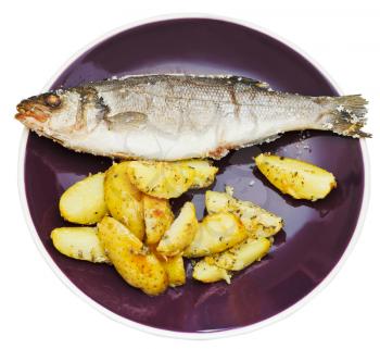 top view of seabass fish baked in salt and fried potatoes on ceramic plate isolated on white background