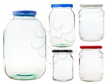 set of closed glass jars isolated on white background