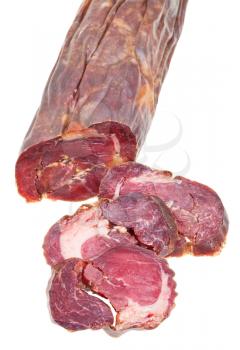 sliced horse meat sausage kazy close up isolated on white background