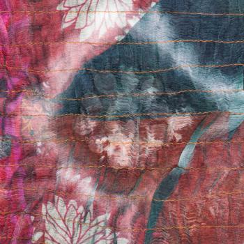square pattern on stitched silk batik close up