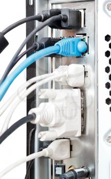 back side of computer isolated on white background - many cables and connectors