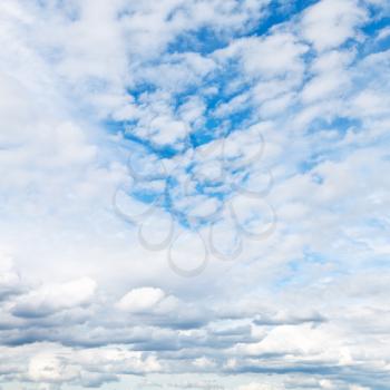 cumuli white clouds in cloudy sky in summer day