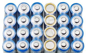 many AA electric batteries close up isolated on white background