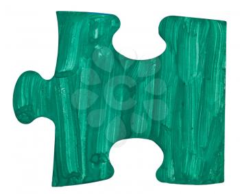 one green painted piece of puzzle isolated on white background