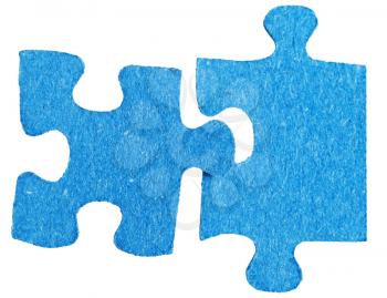 connecting of two separated jigsaw puzzle pieces isolated on white background