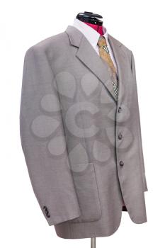 business suit on tailor mannequin - pink woolen jacket with shirt and tie isolated on white background
