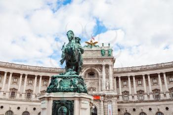 travel to Vienna city - statue of Prince Eugene of Savoy and Neue Burg Palace in Hofburg, Vienna, Austria