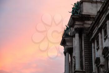 travel to Vienna city - pink sunrise and Neue Burg of Hofburg Palace in Vienna,Austria