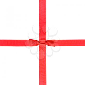 one red satin bow knot in center and two intersecting ribbons isolated on square white background