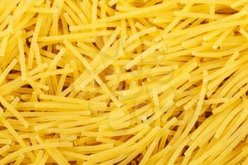 food background - durum wheat semolina pasta filini