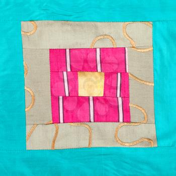 textile background - square ornament of patchwork cloth