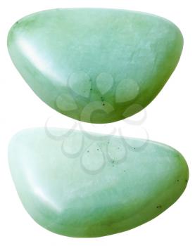 natural mineral gem stone - two opal gemstones isolated on white background close up