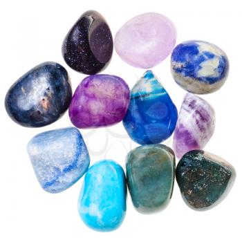 pile of blue and violet natural mineral gemstones isolated on white background