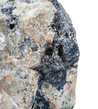 macro shooting of natural mineral stone - black Ilmenite mineral in Nepheline (nephelite) rock isolated on white background