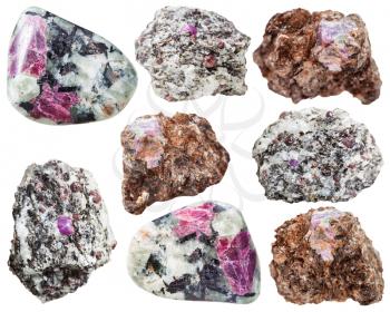 set of various natural mineral stones - corundum crystal in rocks isolated on white background