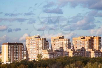 modern apartment houses in urban quarter in sunny autumn day