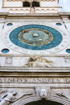 travel to Italy - clock on tower of Palazzo del Capitanio on Piazza dei Signori in Padua city close up, Italy
