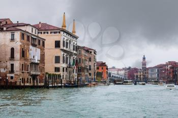 travel to Italy - palaces and Rialto Bridge on Grand Canal in Venice city in rainy autumn day