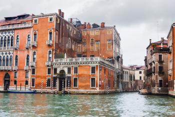 travel to Italy - wet apartment buildings in Venice in autumn rain