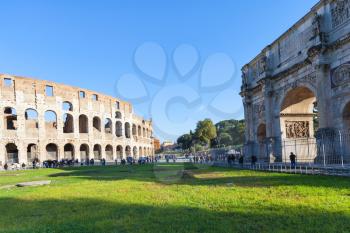 travel to Italy - Arch of Constantine and roman amphitheatre Colosseum in Rome city