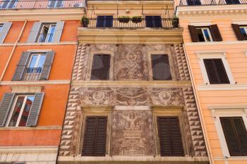 travel to Italy - medieval facade of house on street via Francesco Crispi in Rome city