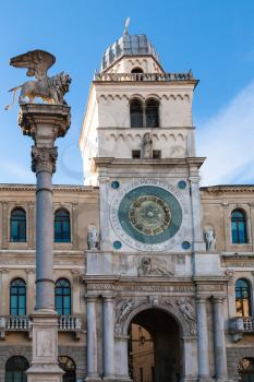 travel to Italy - front view of winged lion column and clock tower of Palazzo del Capitanio in Padua city