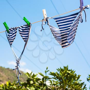 agricultural tourism in Italy - swim suit dry in garden outdoors in Sicily is summer sunny day
