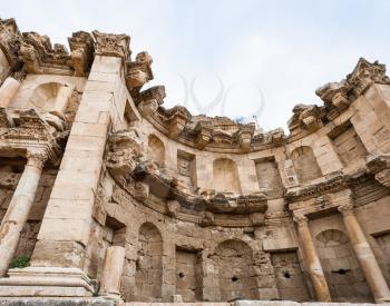 Travel to Middle East country Kingdom of Jordan - wall of nymphaeum in Jerash (ancient Gerasa) town in winter